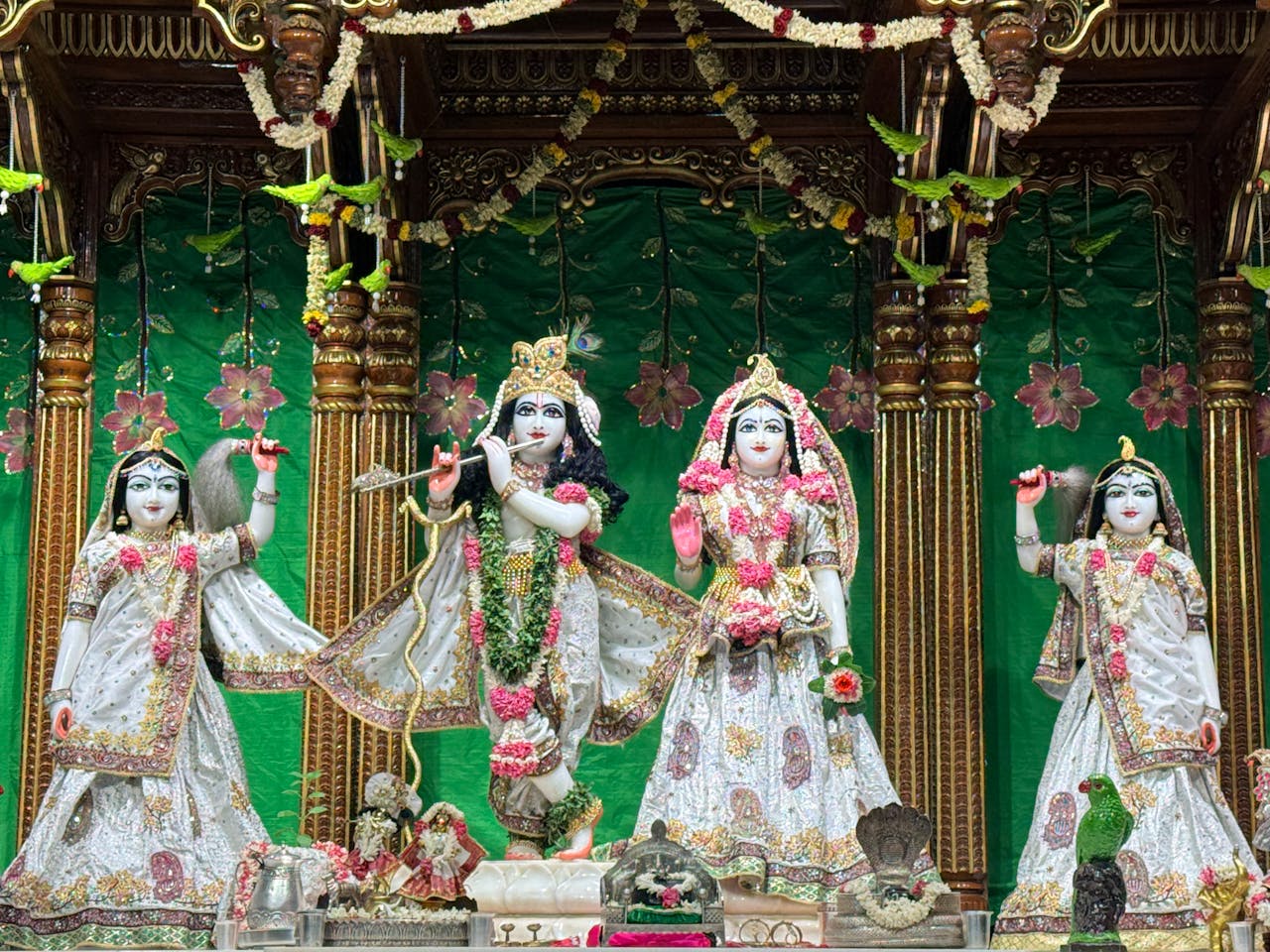 Ornate altar depicting Hindu deities in a temple in Tirupati, Andhra Pradesh, India.